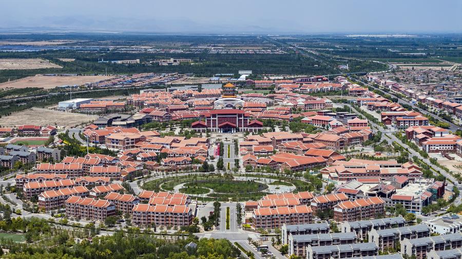 Once a symbol in poverty fight, Chinese town explores sustainable development